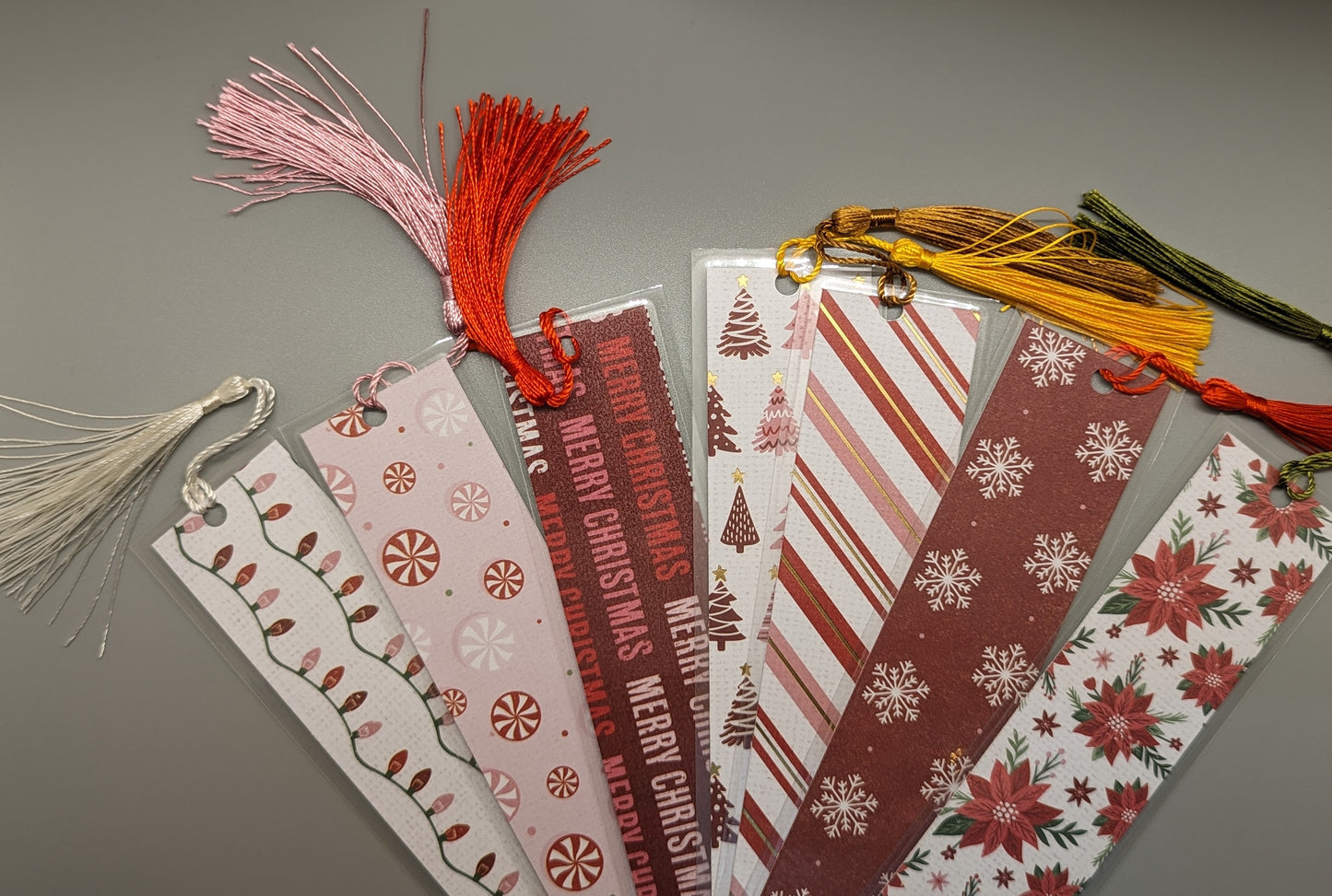 Festive holiday bookmarks with tassels.