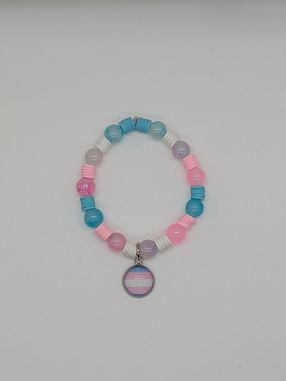 Bracelet with colorful beads and a flag charm on a white background