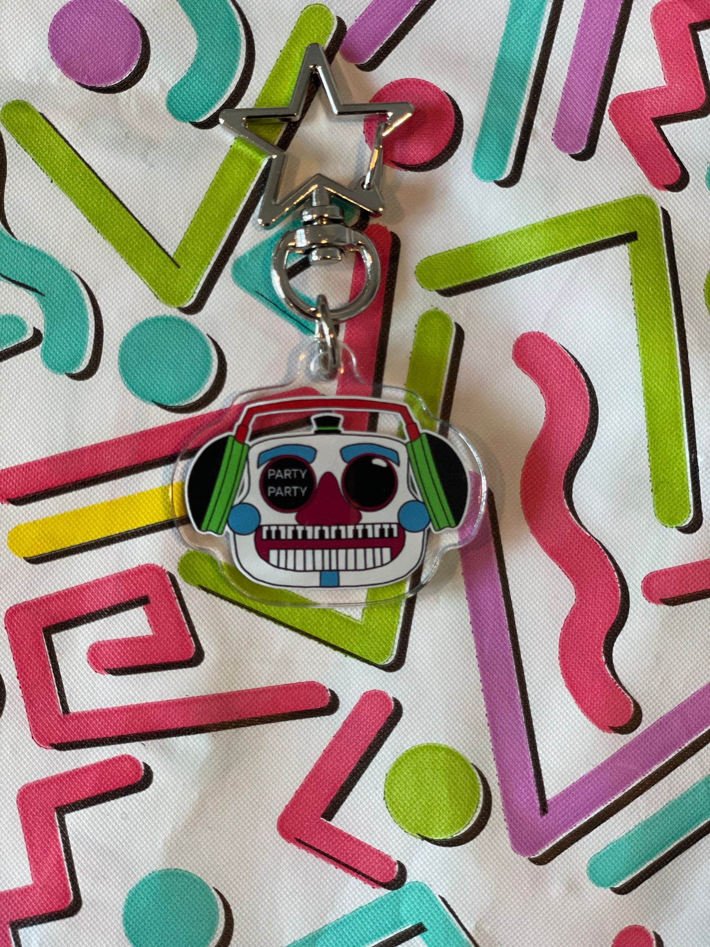 Acrylic keychain of DJ Music Man from FNAF Security Breach.