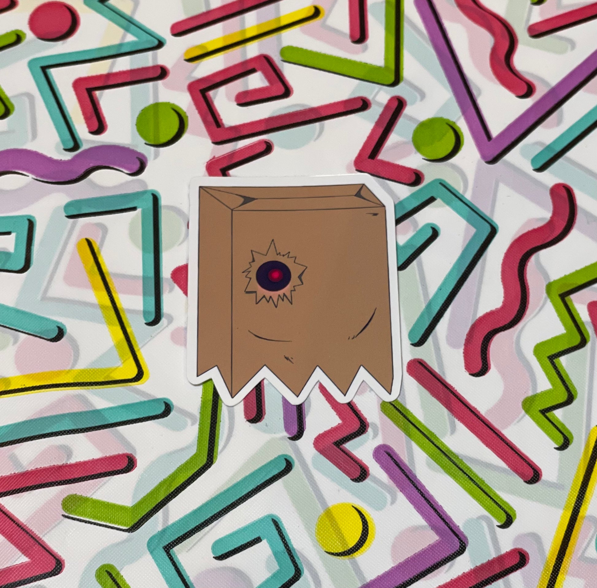 A collection of colorful vinyl stickers featuring characters from the Guilty Gear Strive video game, displayed on a white background with abstract shapes.