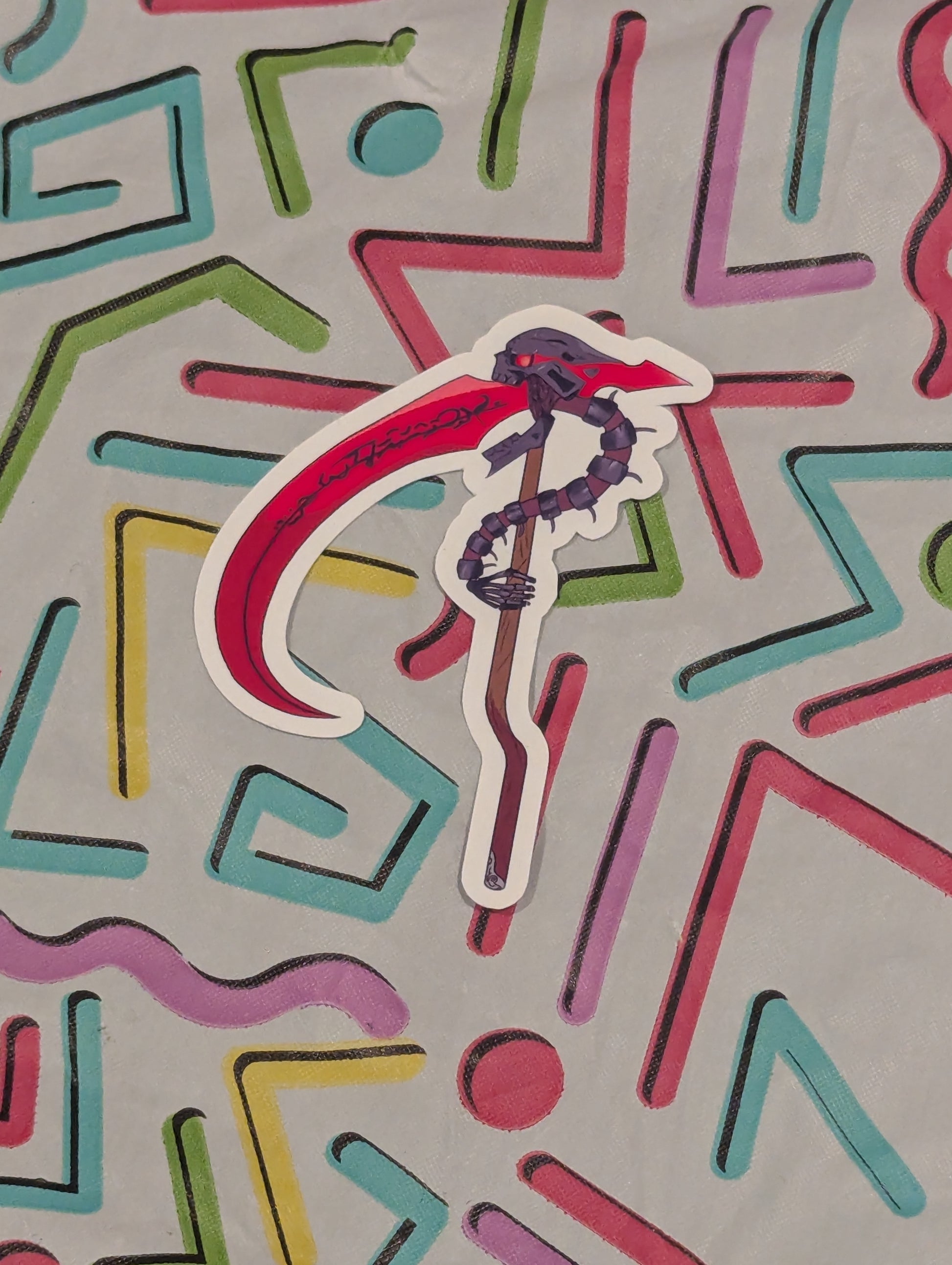 Colorful geometric pattern with a central logo on a textured background