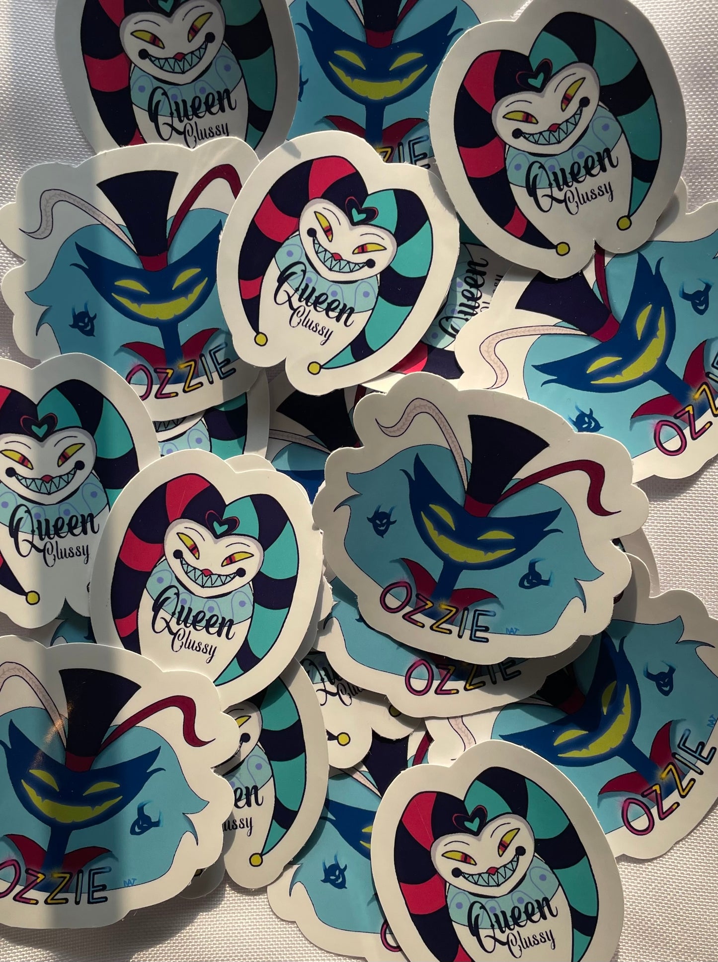 Collection of 'Queen Classy' and 'Ozzie' stickers on a white background