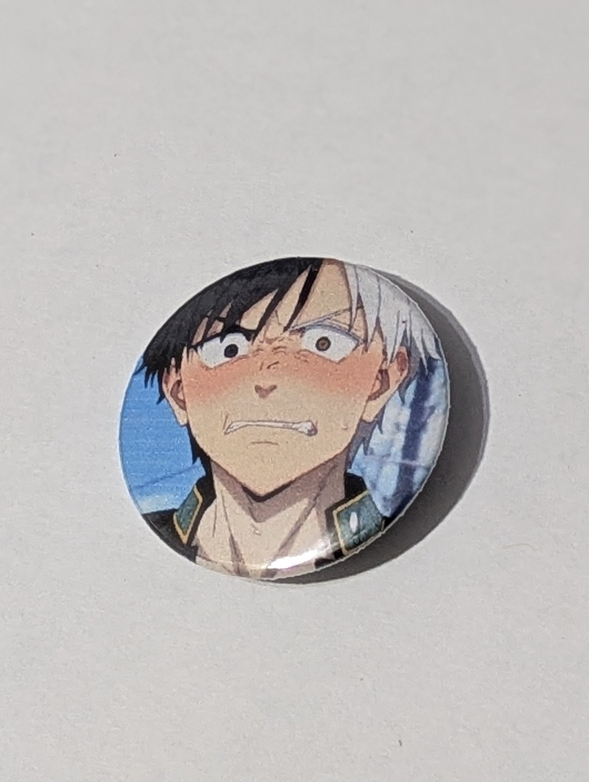 Circular badge with an anime character on a light gray background